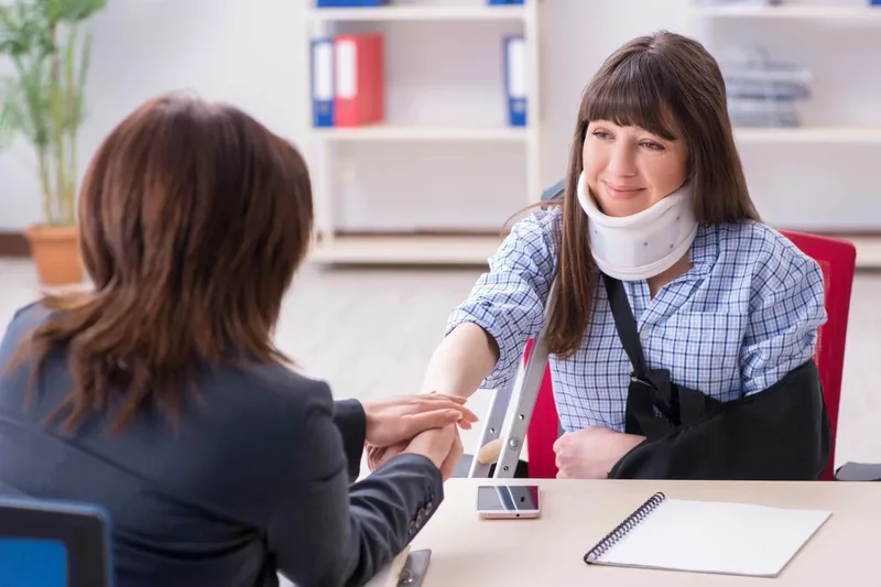 Attorney consulting with an injured client